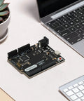 ATmega32U4 Arduino Compatible Microcontroller Board With USB Type C Cable, DIY Starter Kit, 7 To 12V Input, 16MHz Clock, 20 Digital IO Pins With PWM, 2.5KB SRAM, Ideal For Prototyping Projects And Learning Electronics. Black microcontroller board on desk beside laptop