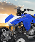 Blue ATV at sunset, suitable for use with Heavy Duty Ratchet Tie Down Straps Set 1500 Lb Break Strength 1 Inch By 15 Foot
