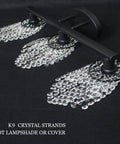 Black Three Light Bathroom Vanity Light Fixture With Crystal Drops Over Mirror featuring matte black frame and K9 crystals