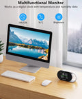 Smart Air Quality Monitor With PM2.5 Sensor, WiFi, Temperature And Humidity Tracking on desk next to computer in home office