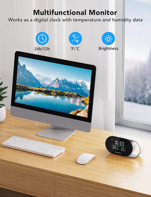 Smart Air Quality Monitor With PM2.5 Sensor, WiFi, Temperature And Humidity Tracking on desk next to computer in home office