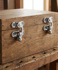 Dope Antique Style Hasp Latch 2 Piece Set With All Needed Screws For Jewelry Boxes And Toolboxes on a wooden box