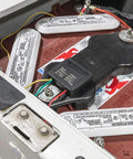 Tough Electric Golf Cart Voltage Step Down Adapter Drops 24 36 48 Or 72 Volts To Solid 12 Volt Power, installed on a battery.