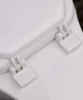 Hinges and closure on the Plush Cushioned Toilet Seat In Desert White For Elongated Bathrooms Soft Vinyl Comfort Upgrade