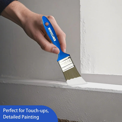 Hand holding a paintbrush from the 30 Pack Paint Brush Set With 5 Sizes 0.5 In 1 In 1.5 In 2 In 2.5 In Dope For Walls Furniture And Crafts Durable Bristles No Shedding