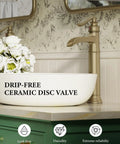 Brass Construction Black And Gold Vessel Sink Faucet With Tall High Arc Body next to white ceramic sink in modern bathroom