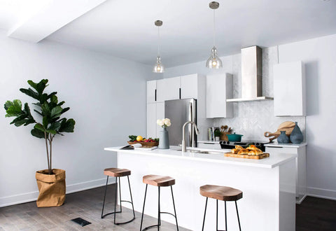 Modern kitchen with 1 light indoor adjustable mini pendant in brushed nickel with hand blown seeded glass over island, set of 2.