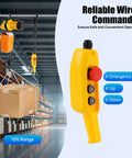 Real Deal One Ton Electric Chain Hoist Handling 2200 Pound Loads with wired controller and box in warehouse setting.