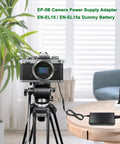 Nikon camera connected to EN-EL15 Dummy Battery And Power Supply Kit For Nikon Cameras EP-5B AC Adapter on tripod in living room.