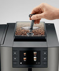 Premium Top Shelf Fully Automatic Coffee Machine Featuring Cold Brew Options And Thirty Four Recipes With Smart Touchscreen, showing coffee beans and touch control.