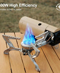 Go To Portable Camping Stove 1400W Butane Collapsible Backpacking Stove on wooden table with blue flame burning