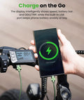 Powerful 1000W Fat Tire Electric Bike For Adults And Teens, 20 MPH Top Speed, 20x4 Fat Tires, Removable 10.4Ah Battery, USB Charging Port, 7-Speed Mountain And Commuter Ebike, Four Bikes In One For City, Trail, Snow And More. Bike display with USB charging and phone showing 75% charged