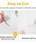 Cutting demonstration of Knockout Look Waterproof Peel And Stick Wallpaper Roll featuring scissors and seamless splicing technique.