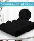 Premium Microfiber Cleaning Cloths 150 Pack 11.5 By 11.5 Inches Lint Free Streak Free Soft Rags rolled black towels on table.
