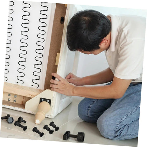 Heavy Duty Steel Screws And Nuts 170 Set Assortment Kit For Furniture Assembly used for securing a bed frame during setup.