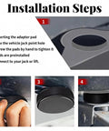 Tesla jack pads 4-pack; black circular lifting pucks with textured grip and storage case