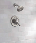 Lahara 17 Series Dual Function Shower Trim Kit With 5 Spray Touch Clean Shower Head Stainless Finish T17238-SS on tiled wall