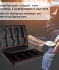 Solid Eight Grid Wristwatch Storage Box Built Tough With Heavy Duty Carbon Pu Leather And Adjustable Splitter Plate for display on a desk.