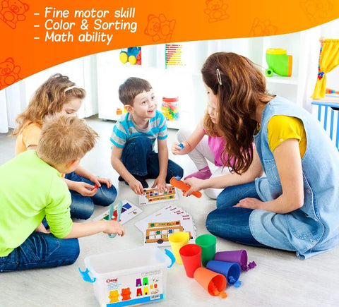 Children using Super Cool Rainbow Counting Bears Set Sixty Bright Plastic Bears And Matching Sorting Cups in a preschool setting.
