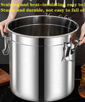 Knockout 26 Gallon Airtight Bulk Food Storage Bucket Rock Solid 304 Stainless Steel Canister with secure locking lid being lifted.