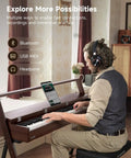 Man playing 88 Key Weighted Keyboard Piano With Graded Hammer Action For Home Studio Bluetooth Connectivity 256 Polyphony