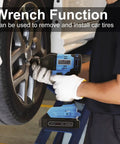 Person using Cordless Brushless Half Inch Impact Wrench With 260 Ft Lbs Max Torque 2.0Ah Battery on car tire