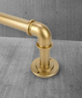 Gold Industrial Curtain Rods For Windows 48 To 84 Inches, 1 Inch Diameter, featuring a metal elbow joint for wall mount