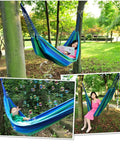 Durable Portable Cotton Hammock For Camping And Outdoor Indoor Use with a person lounging among trees