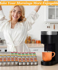 Woman smiling in kitchen with Expandable K Cup Holder Drawer For Keurig Pods, Holds 30 To 60 Coffee Pods on counter with coffee maker.