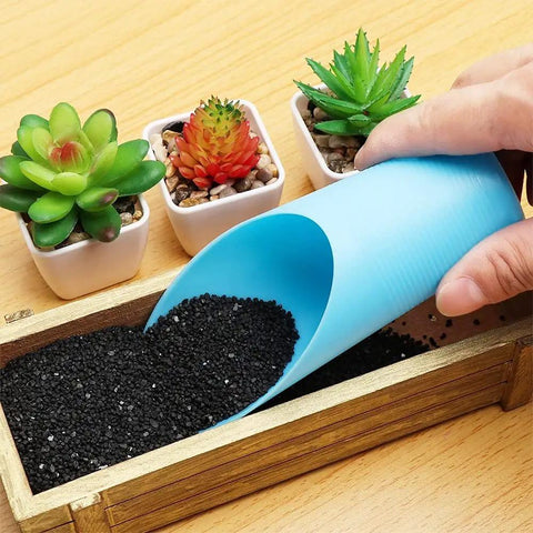 Go-To Reusable Plastic Garden Shovel Cup For Bonsai And Potted Plants 16x6 cm Cultivation Tool Spade Soil Scoop For Succulents And Fleshy Plants Handy Garden Care Essential For Plant Lovers. Blue plastic scoop pouring soil into bonsai tray