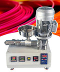 Easy Peasy Pro Desktop 3D Printer Filament Maker Single Screw Extruder Machine With Fast Temp Swaps Creating Spools From Abs Pet Pla Tpu Pellets Garage Setup demonstrating a compact circuit with a stainless steel funnel.