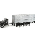 Peterbilt 1 By 16 Scale Semi Truck With Livestock Trailer And Four Cows, front view featuring black truck and silver trailer, durable farm toy.