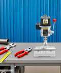 Compact 340W Mini Benchtop Drill Press, Portable Electric Table Drill Machine with tools on a workbench.