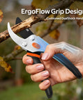 Heavy Duty Pruning Shears 8.5 Inch Pro Garden Pruner with jam-proof spring cutting a branch in hand