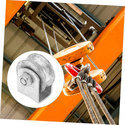 Industrial cast-iron grooved pulley wheel with bolt for garage door roller replacement; front view.