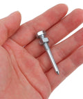 Hand holding a single heavy duty silver metal spike from 20 Pack Lawn Spikes For Aerator Shoes