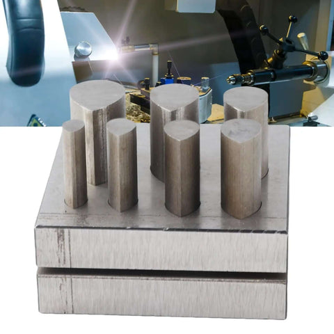 Disc Cutter Set For Jewelry Making With Seven Drop Shaped Dies Flat Bottom Punch Tool Pro Grade 45 Steel on metal block
