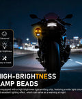 2 Pieces LED Motorcycle Turn Signal Lights With Skull Design Waterproof Blinkers shown on a motorcycle at night