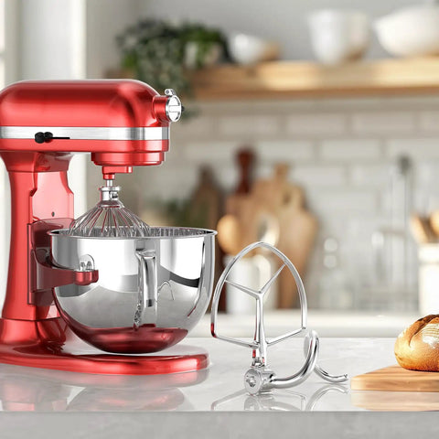 7Quart Stainless Steel Flat Beater for Stand Mixer Replacement Paddle Attachment next to red KitchenAid mixer on counter