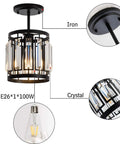 Four Light Farmhouse Pendant Chandelier For Dining Room And Kitchen Island Modern Black Crystal Lights Over Table E26 Base Fixture Durable K9 Crystals With Stainless Steel Rustic Yet Sleek Kitchen Lighting showing details of iron base, crystal structure, and bulb support.