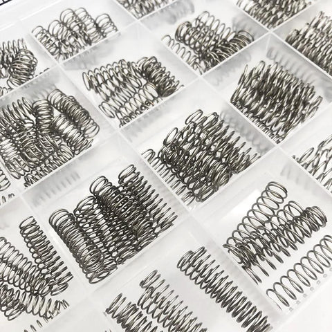 225-piece stainless steel compression spring set in a clear 24-compartment organizer tray