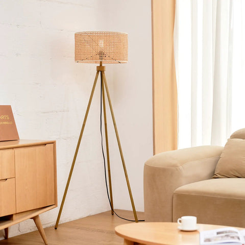 60 Inch Floor Lamp With Faux Wood Tripod Base And Rattan Shade On Off Rotary Switch For Easy Control in a cozy living room