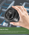 Hand holding Universal 2-Inch T2 Telescope Camera Adapter For SLR DSLR - Durable Metal M42 T Mount Attachment