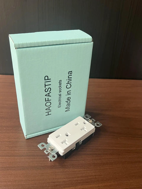 Top Shelf Modern Wall Socket With Two Openings Heavy Duty Electrical Receptacle Plug rated for Twenty Amps next to its packaging.