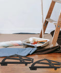 Flip Frame Cabinet Hinges Black Iron Shoe Rack Parts on a wooden floor near painting supplies and a ladder