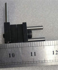 Badass Strength Precision Vise Stop Locators For CNC Milling Machines showing steel components and ruler for sizing.
