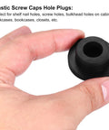 Heavy Duty T Shaped Silicone Plugs 1 Inch Round Slip On Rubber Stopper Hella Tough Waterproof Bulkhead Seal Cover Built To Last For Your Home Sink Projects Black in hand, showing design for sealing holes.