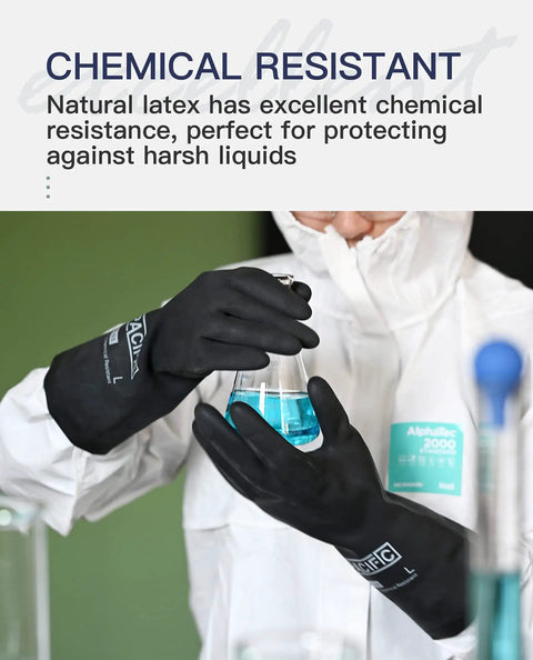Person wearing chemical resistant work gloves built to take a beating heavy duty industrial latex rubber gloves that stand up to acids alkalis oils and solvents ergonomic 12.6 inch large reusable 2 pairs for lab shop or construction handling a beaker in a lab coat.