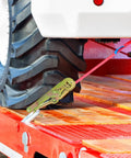 Ratchet Tie Down Straps With Long J Hooks securing heavy-duty cargo on a truck bed, showing close-up of strap, hook, and tire