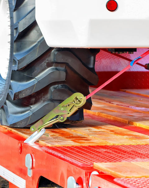 Ratchet Tie Down Straps With Long J Hooks securing heavy-duty cargo on a truck bed, showing close-up of strap, hook, and tire